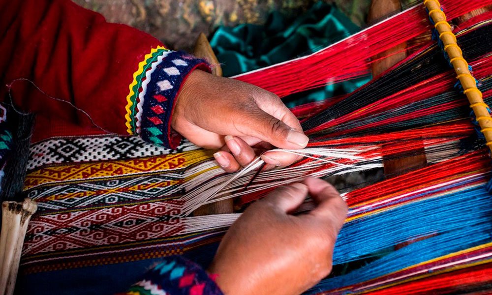 Quechua woman weaving in Chinchero — cultural connection in the Andes